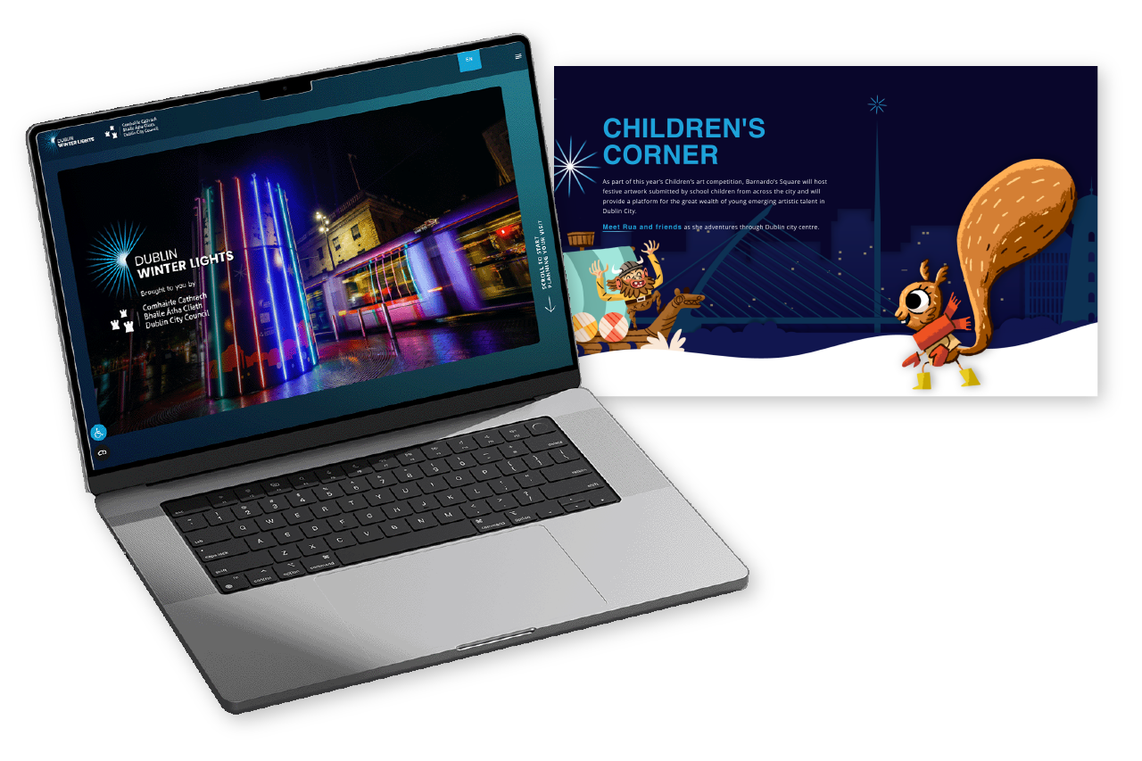 A laptop with the Winter Lights homepage on it and a screenshot of one of the interior illustrations